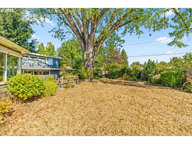 a view of a outdoor sitting area with furniture