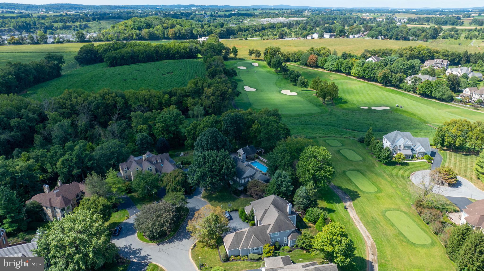 38 Westwind Circle Lititz, PA 17543 - Photo 101 of 113 an aerial view of green landscape with trees houses and lake view