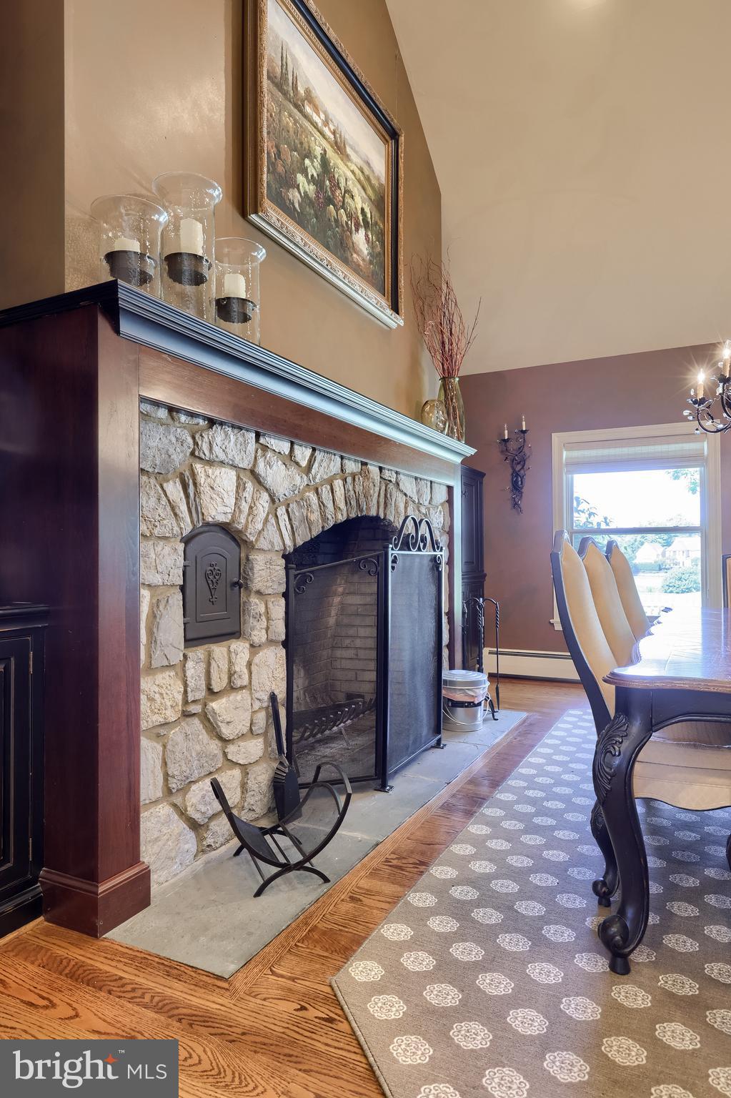38 Westwind Circle Lititz, PA 17543 - Photo 5 of 113 a living room with furniture a window and a fireplace