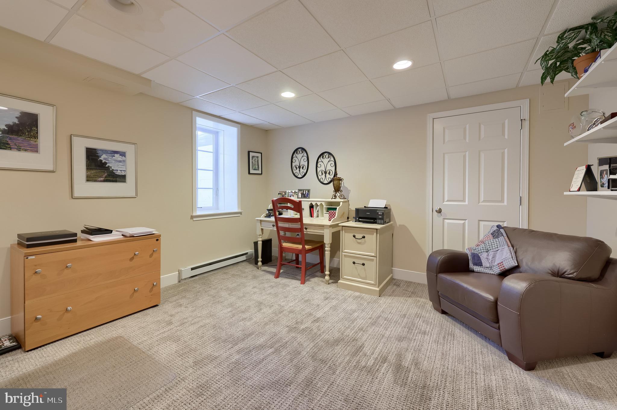 38 Westwind Circle Lititz, PA 17543 - Photo 62 of 113 a living room with furniture and a workspace