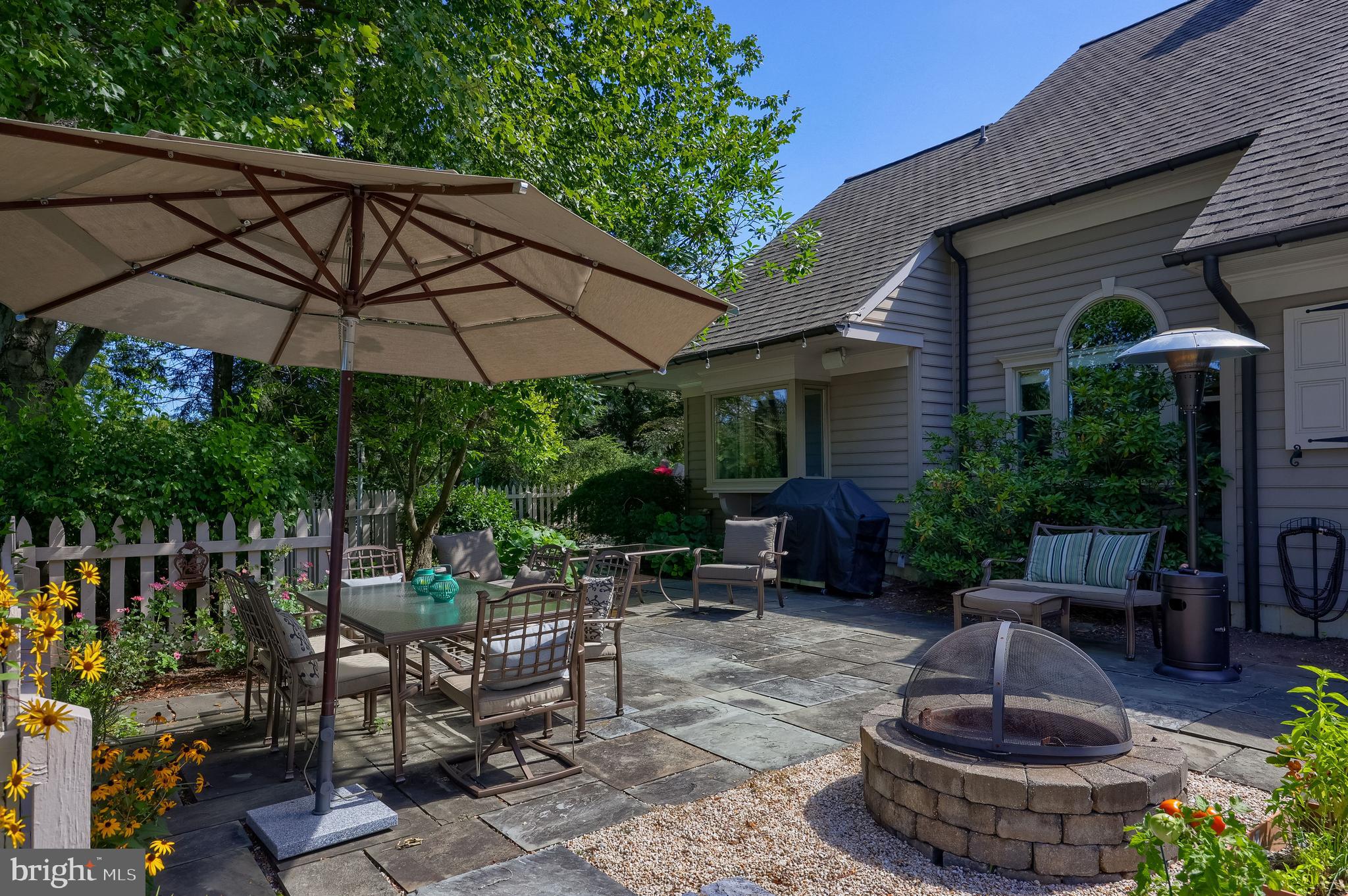 38 Westwind Circle Lititz, PA 17543 - Photo 81 of 113 a view of patio with couches table and chairs under an umbrella
