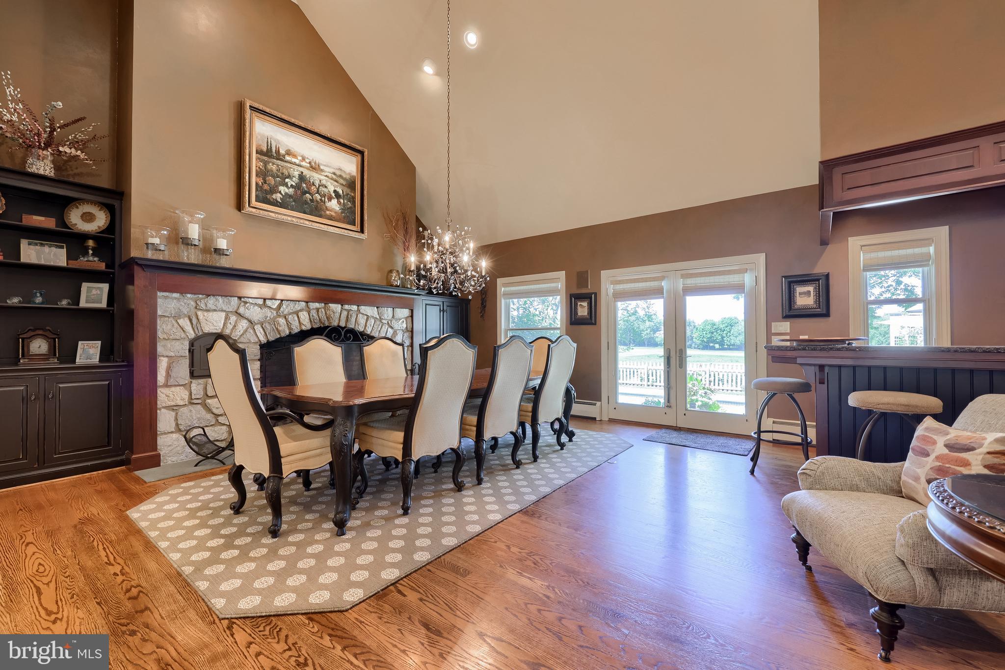 38 Westwind Circle Lititz, PA 17543 - Photo 9 of 113 a dining room with furniture a chandelier and wooden floor