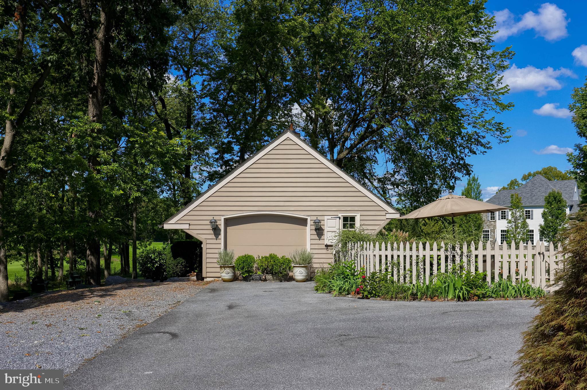 38 Westwind Circle Lititz, PA 17543 - Photo 98 of 113 a front view of a house with a garden and deck