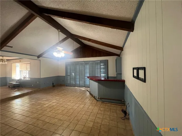 a view of a livingroom with furniture