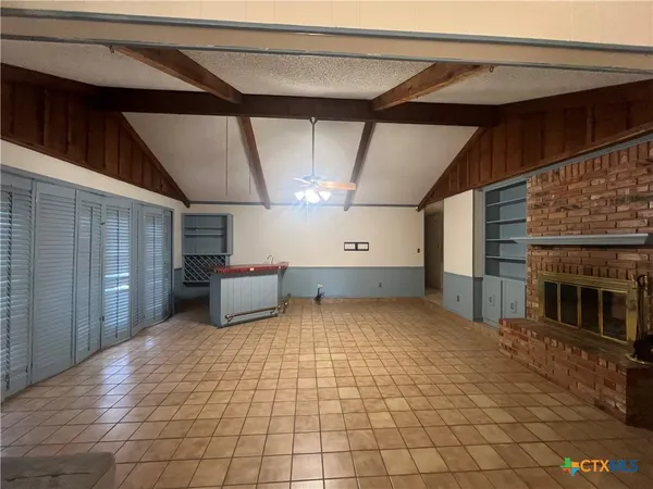 a view of a livingroom with a fireplace