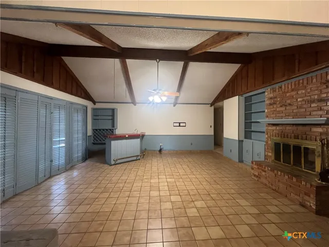 a view of a livingroom with a fireplace