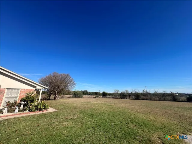 a view of outdoor space and yard