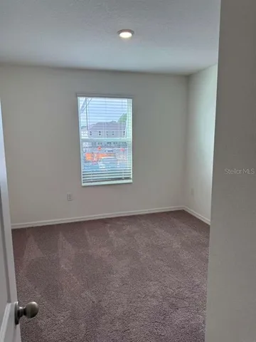 an empty room with a workbench