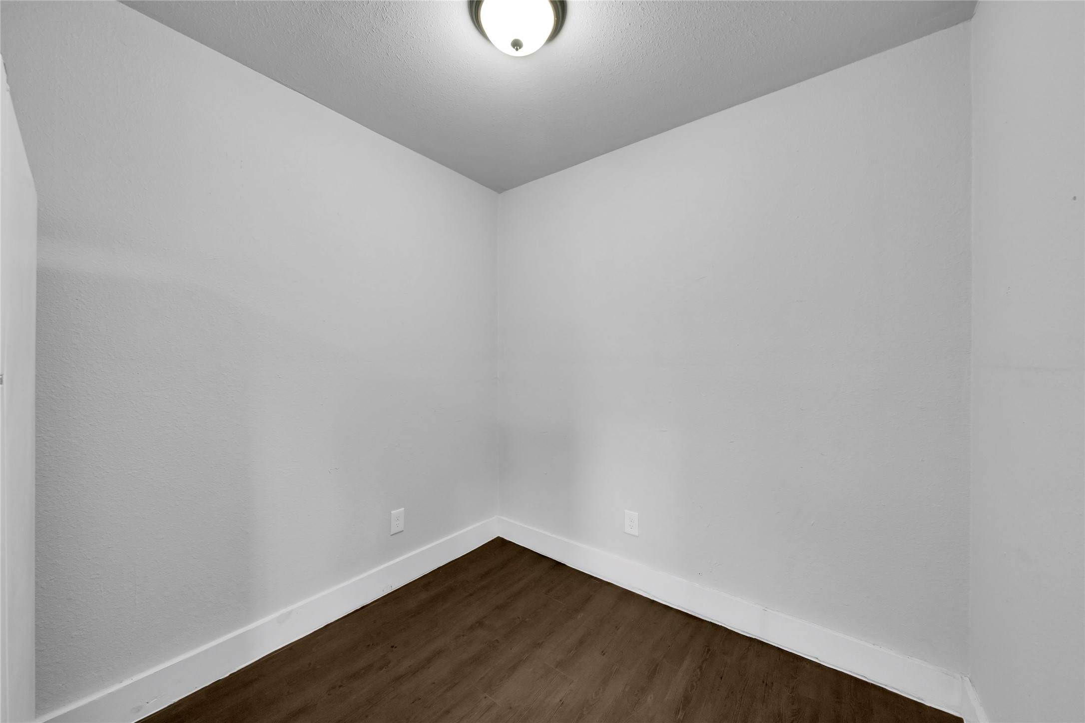 6518 Weston Street, Unit 1 Houston, TX 77021 - Photo 15 of 15 a view of an empty room with wooden floor