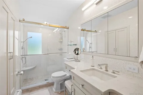 $1,699,999 | 77 Lake Drive, Manhasset Hills, NY 11040