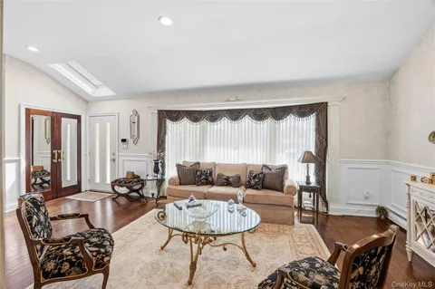 $1,699,999 | 77 Lake Drive, Manhasset Hills, NY 11040