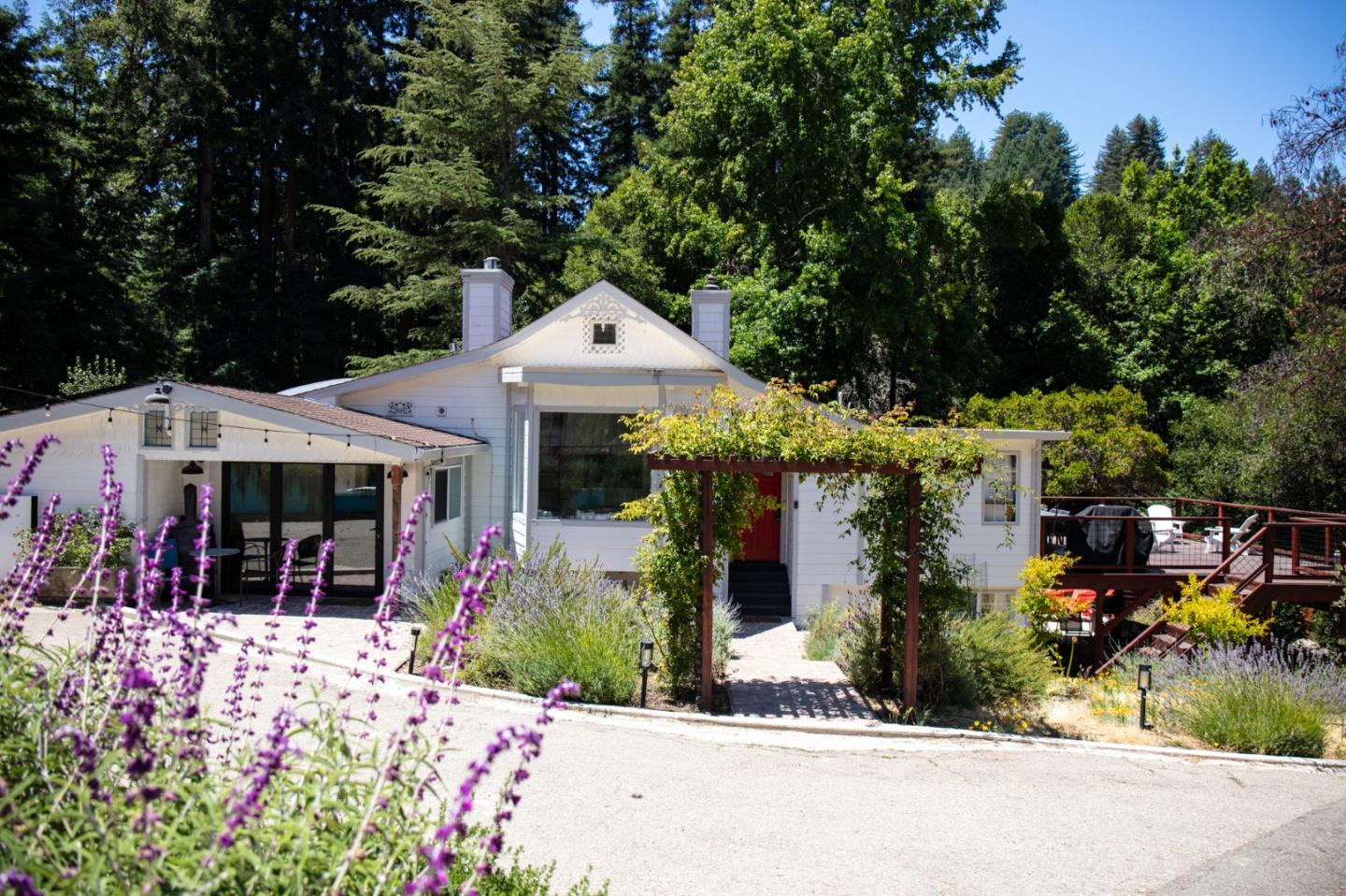 1003 Laurel Glen Road Soquel, CA 95073 - Photo 1 of 101 front view of a house with a yard