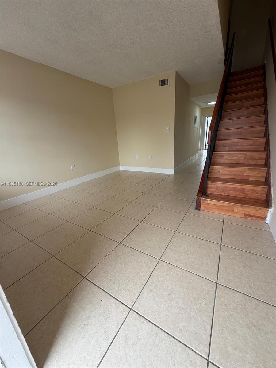 2377 West 66th Place, Unit 204 Hialeah, FL 33016 - Photo 4 of 12 a view of entryway and hall