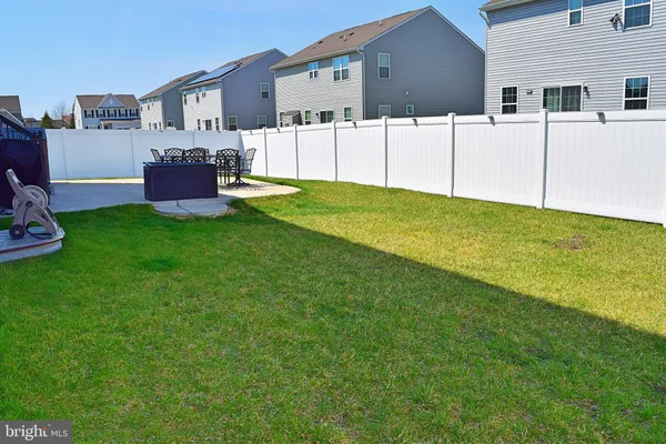 a front view of house with outdoor space and yard