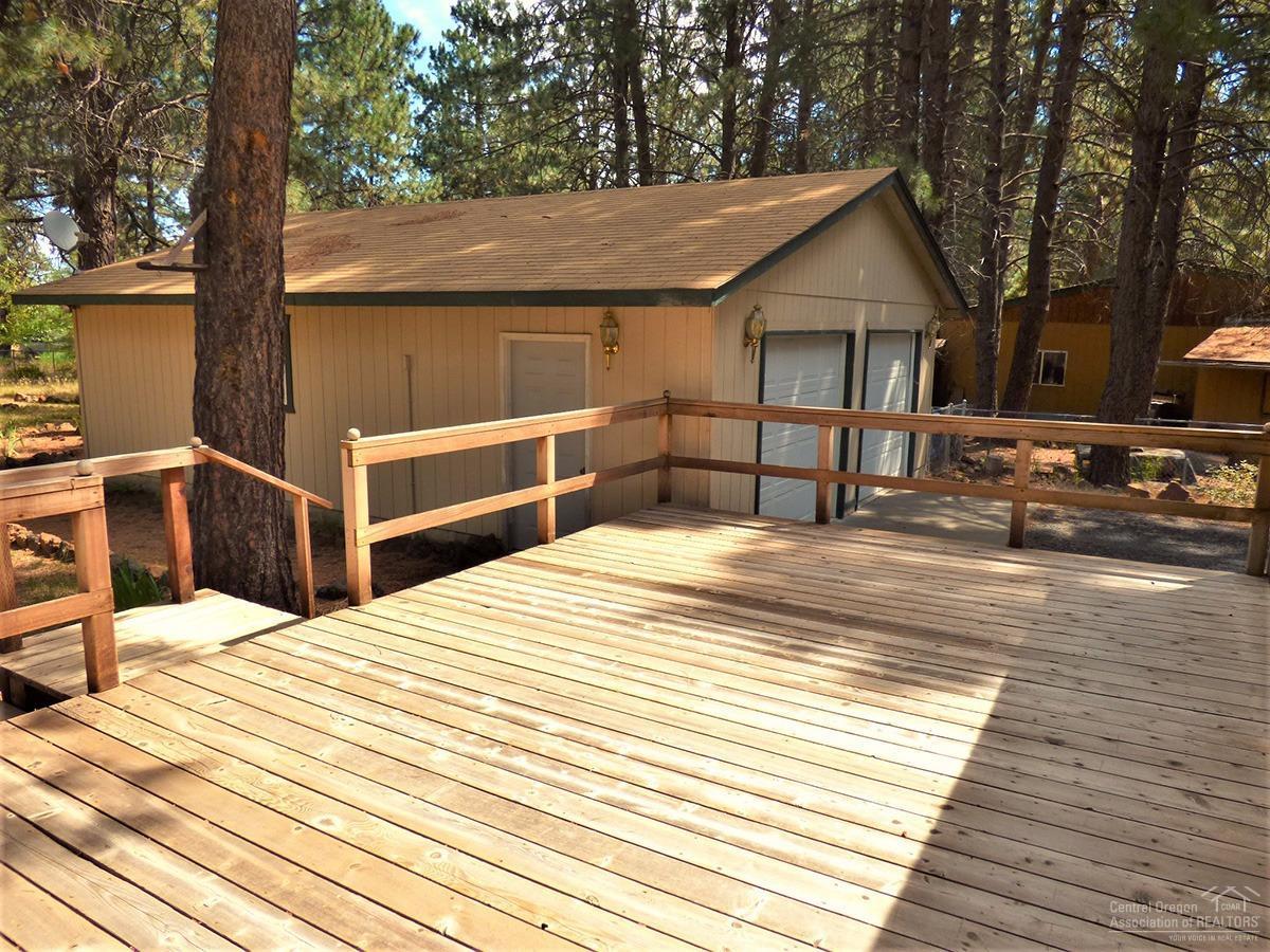 19176 Baker Road Bend, OR 97702 - Photo 20 of 25 a view of a house with wooden floor and a chair