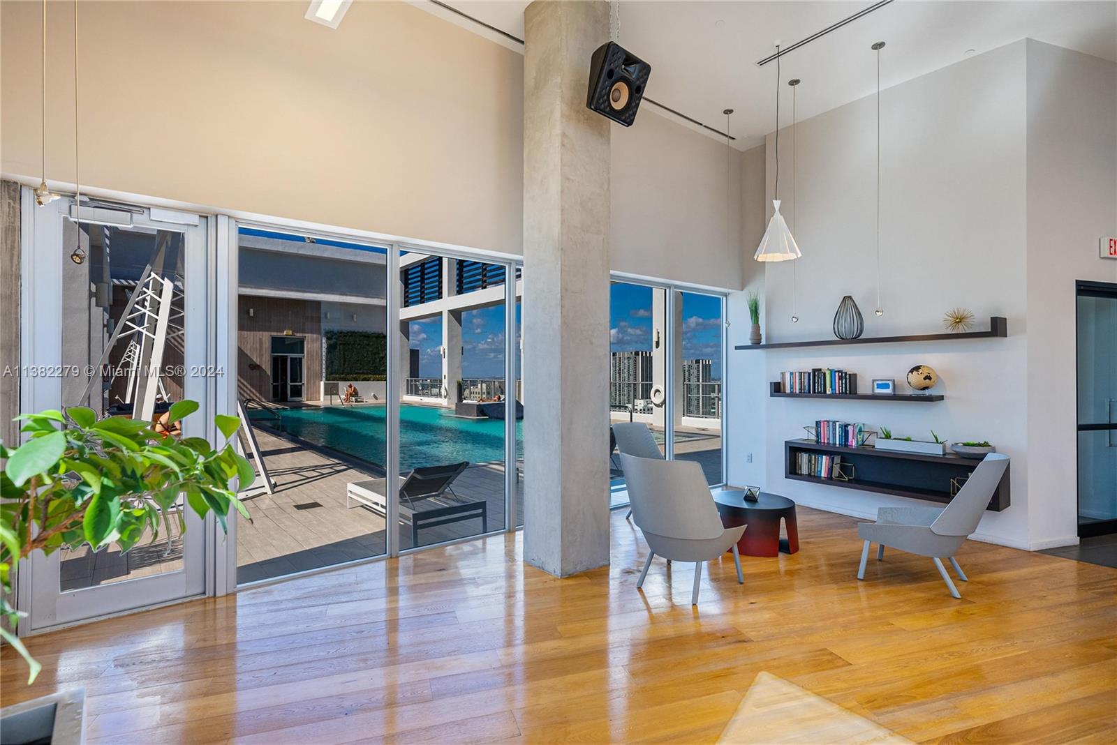 Downtown Miami Miami, FL 33131 - Photo 25 of 26 a living room with furniture and a potted plant
