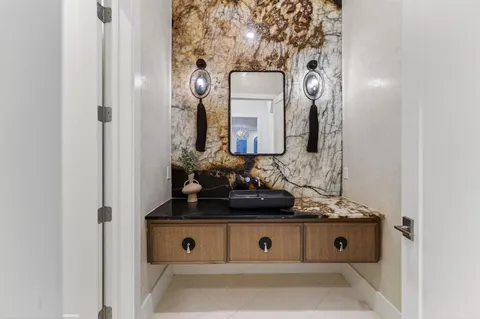 a close view of a sink sitting in a bathroom
