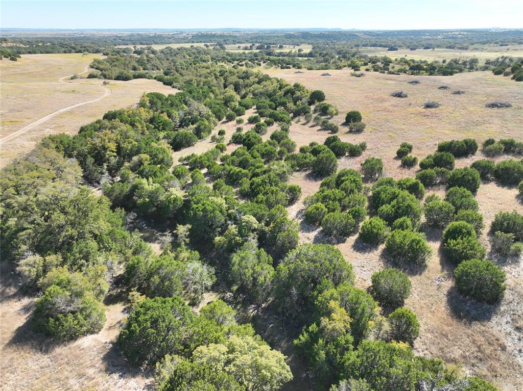 8901 Edwards Road Tolar, TX 76476 - Photo 10 of 24 an aerial view of ocean with beach