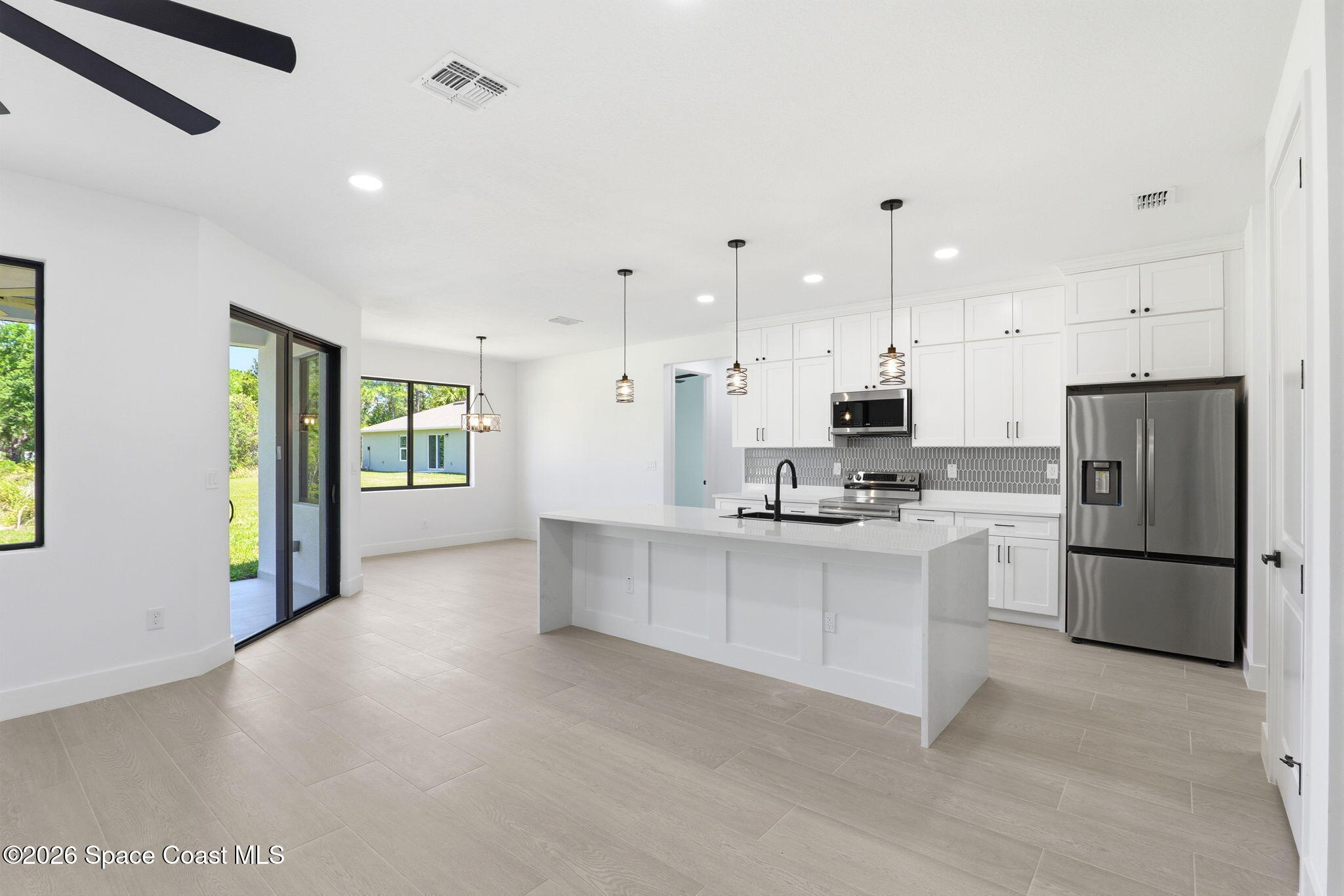 191 Titan Road Southeast Palm Bay, FL 32909 - Photo 5 of 46 6-web-or-mls-889_Reading_St_024