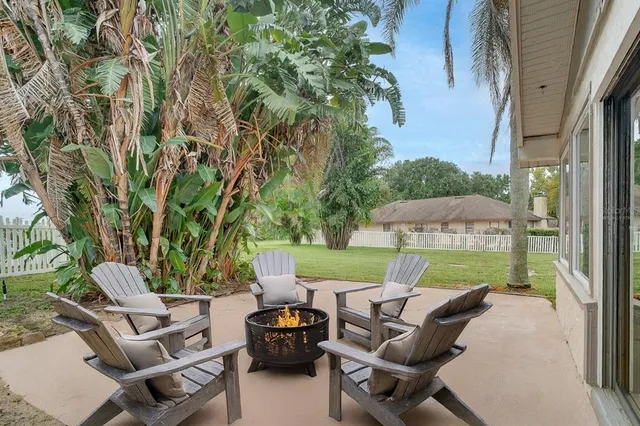 a backyard of a house with garage