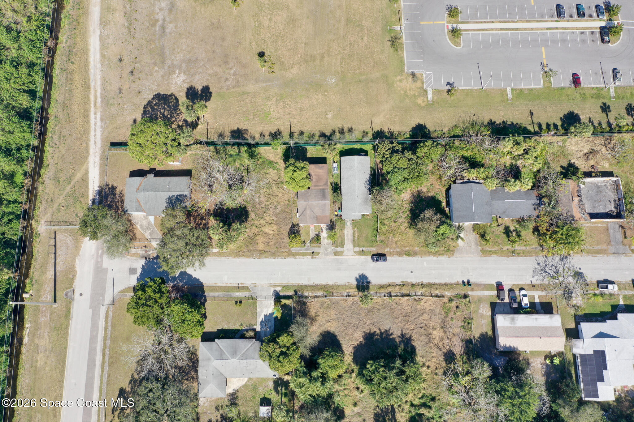 504 Burr Street Melbourne, FL 32901 - Photo 11 of 20 an aerial view of a city with lots of residential buildings