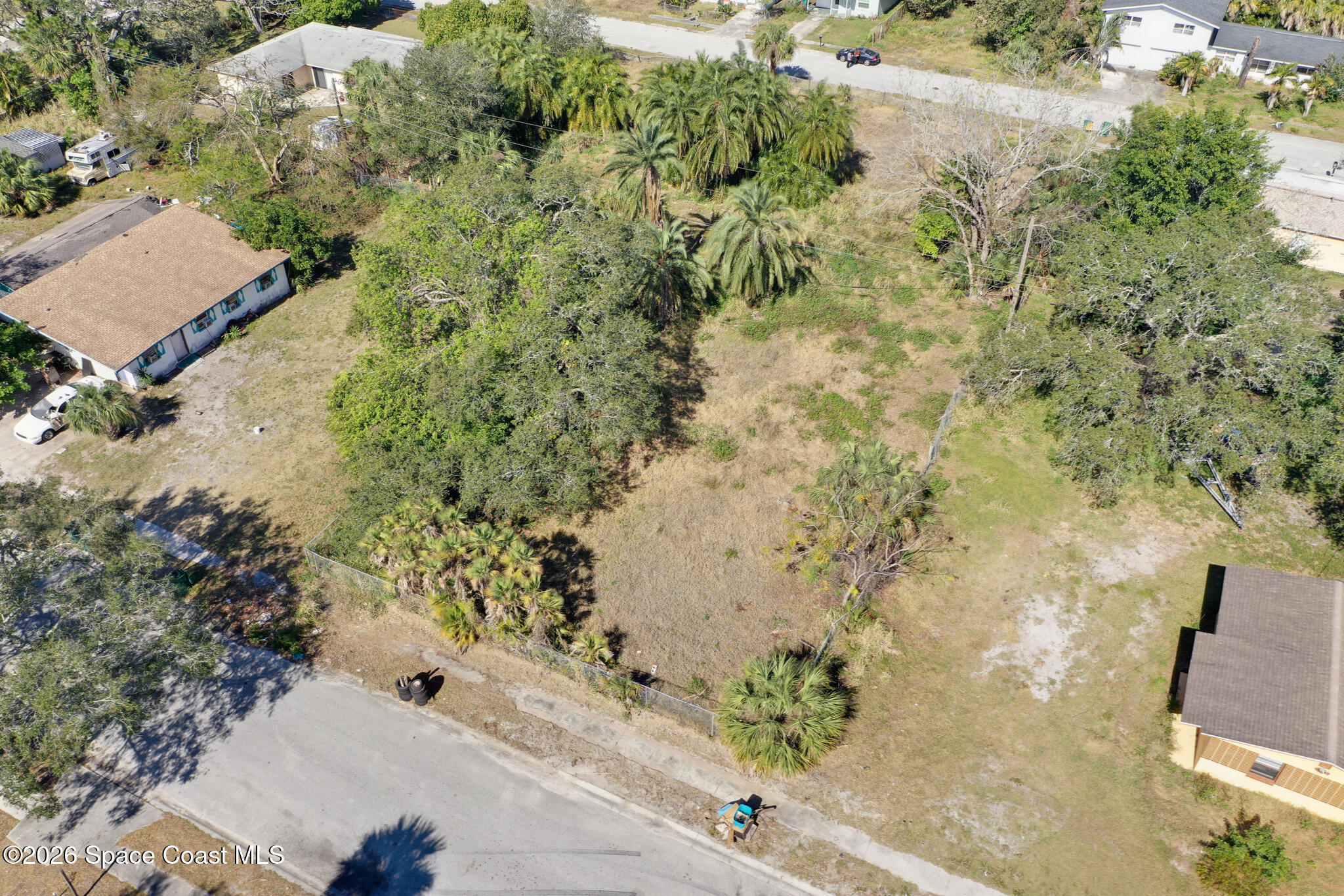 504 Burr Street Melbourne, FL 32901 - Photo 18 of 20 an aerial view of a house with a yard