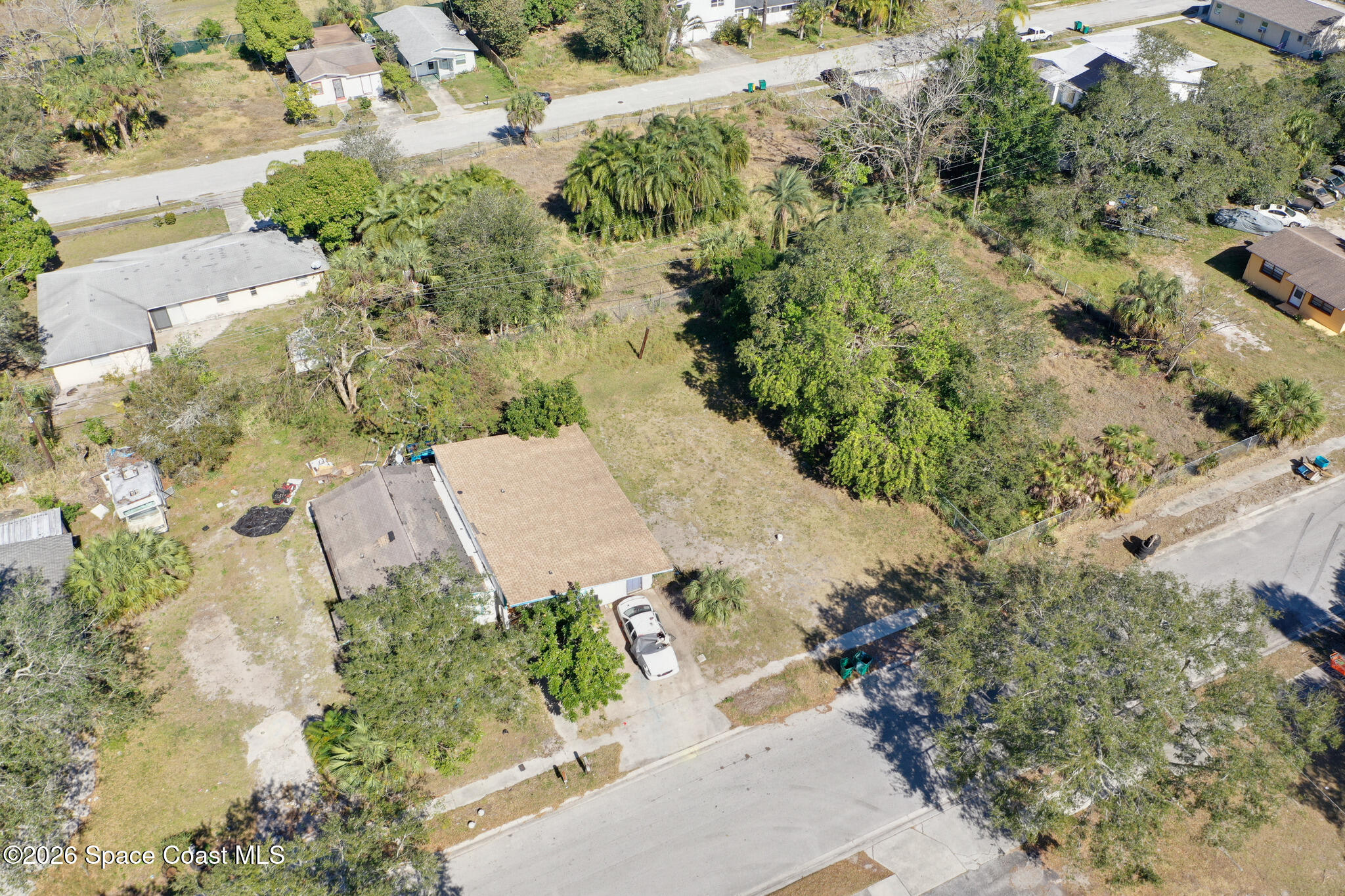 504 Burr Street Melbourne, FL 32901 - Photo 19 of 20 an aerial view of a house with a yard