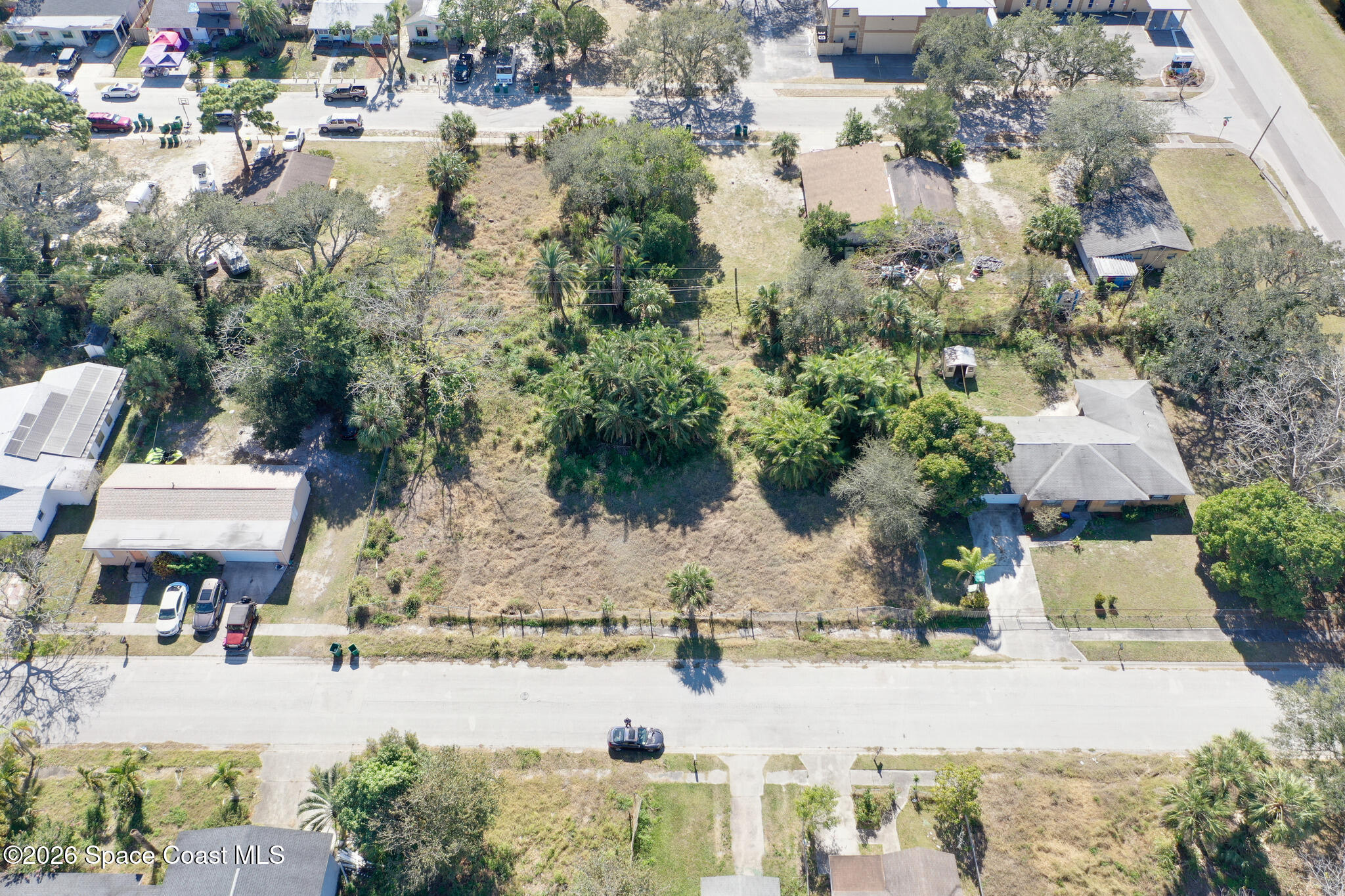504 Burr Street Melbourne, FL 32901 - Photo 3 of 20 an aerial view of residential houses with outdoor space