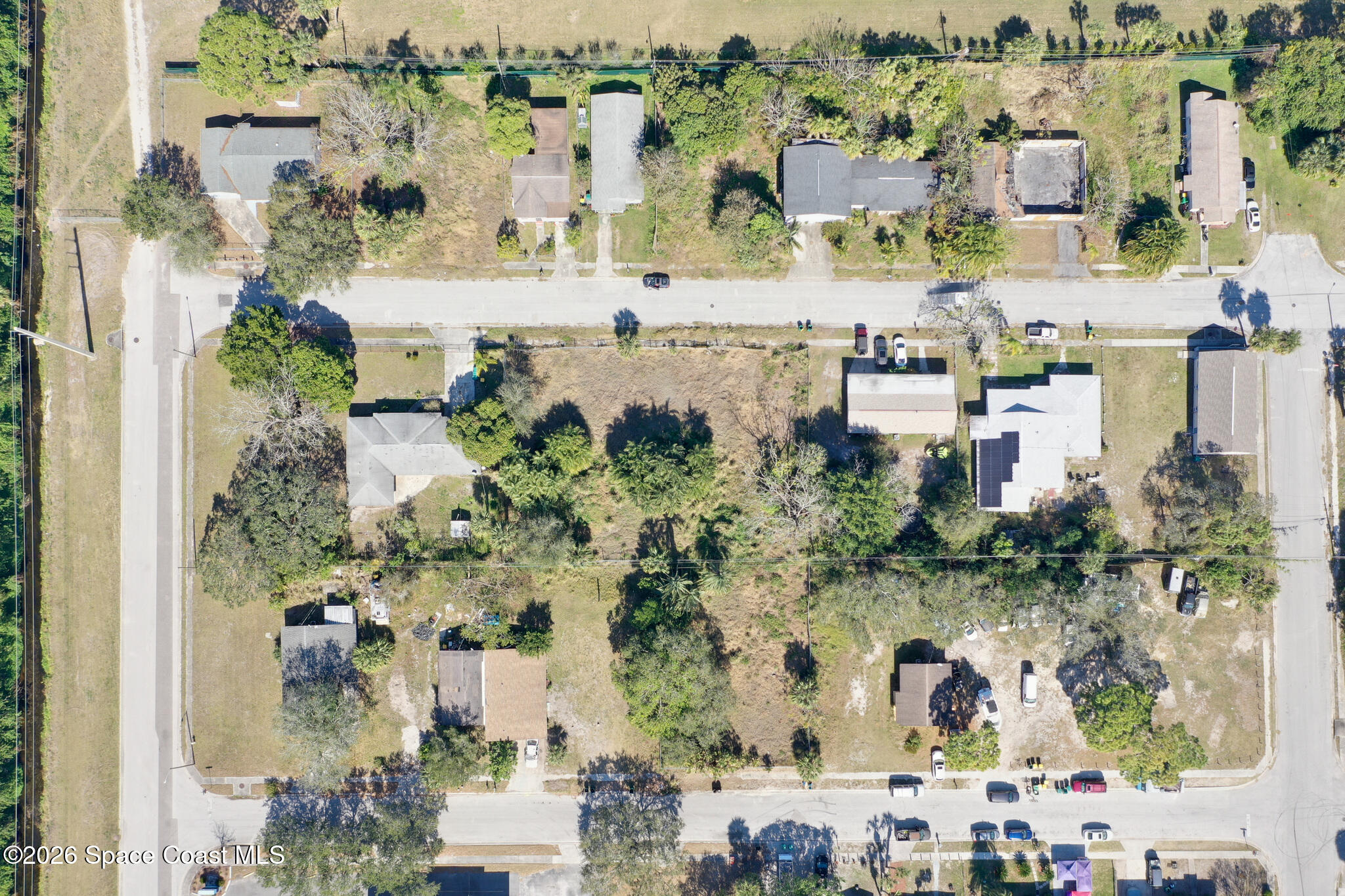 504 Burr Street Melbourne, FL 32901 - Photo 7 of 20 an aerial view of residential houses with outdoor space