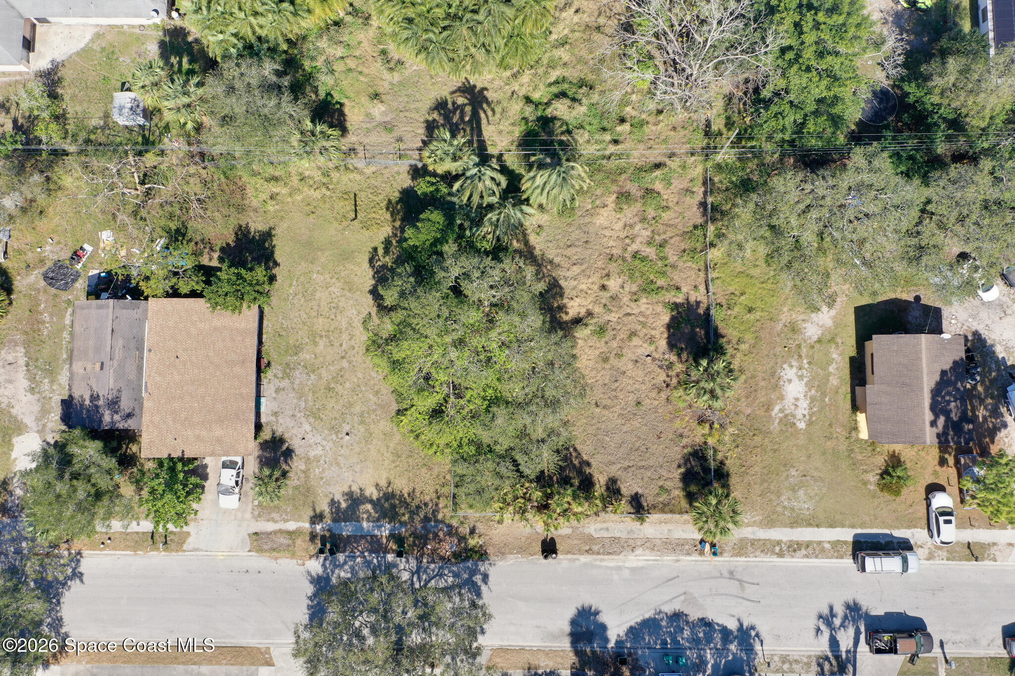 504 Burr Street Melbourne, FL 32901 - Photo 8 of 20 an aerial view of a residential houses with outdoor space