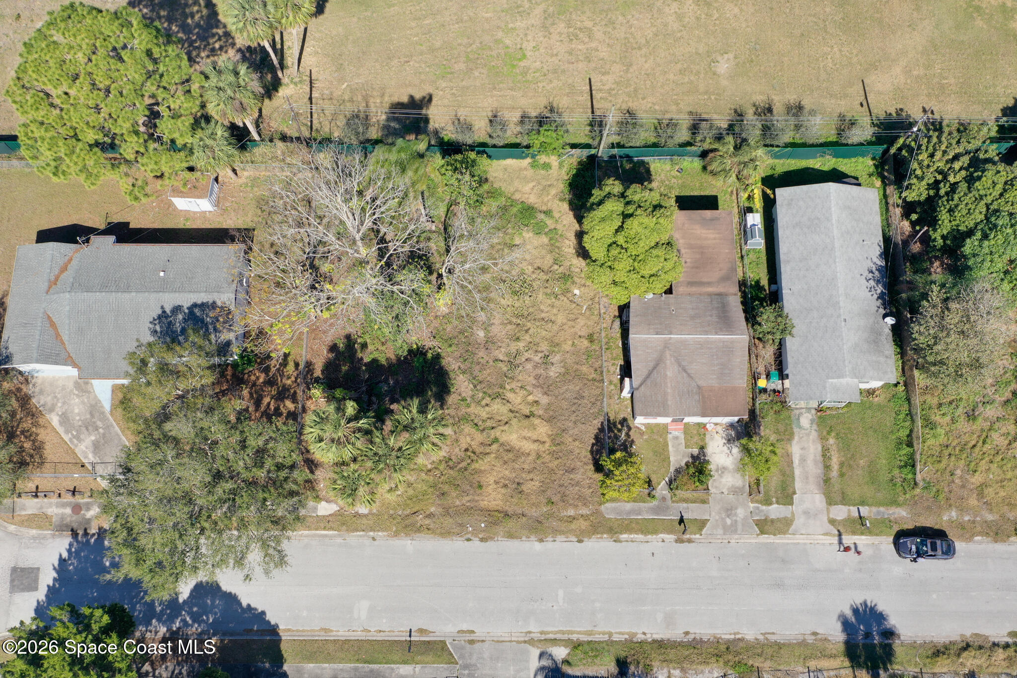 504 Burr Street Melbourne, FL 32901 - Photo 10 of 20 an aerial view of residential houses with outdoor space