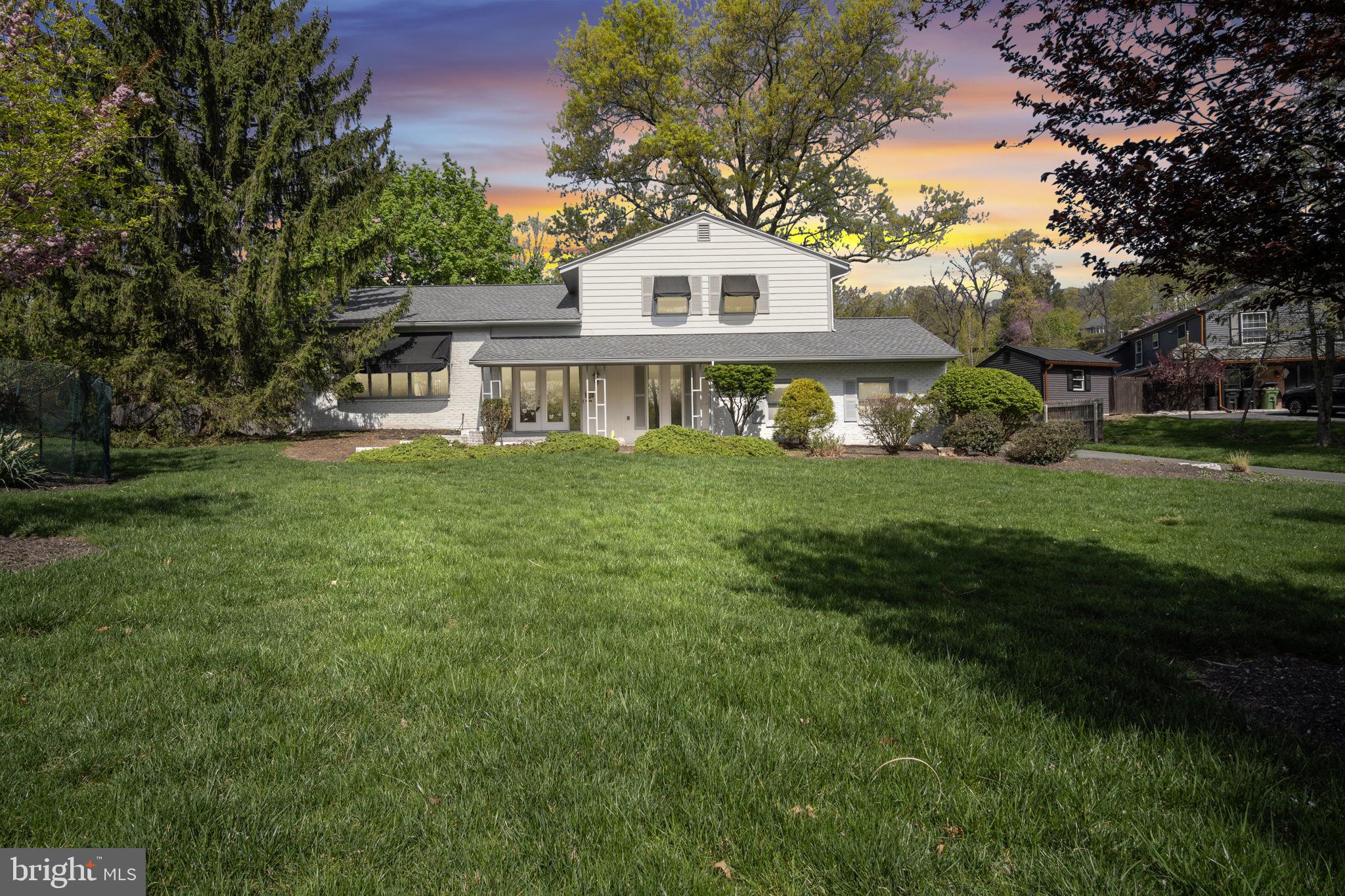 4536 Custer Drive Harrisburg, PA 17110 - Photo 1 of 53 a front view of a house with a garden