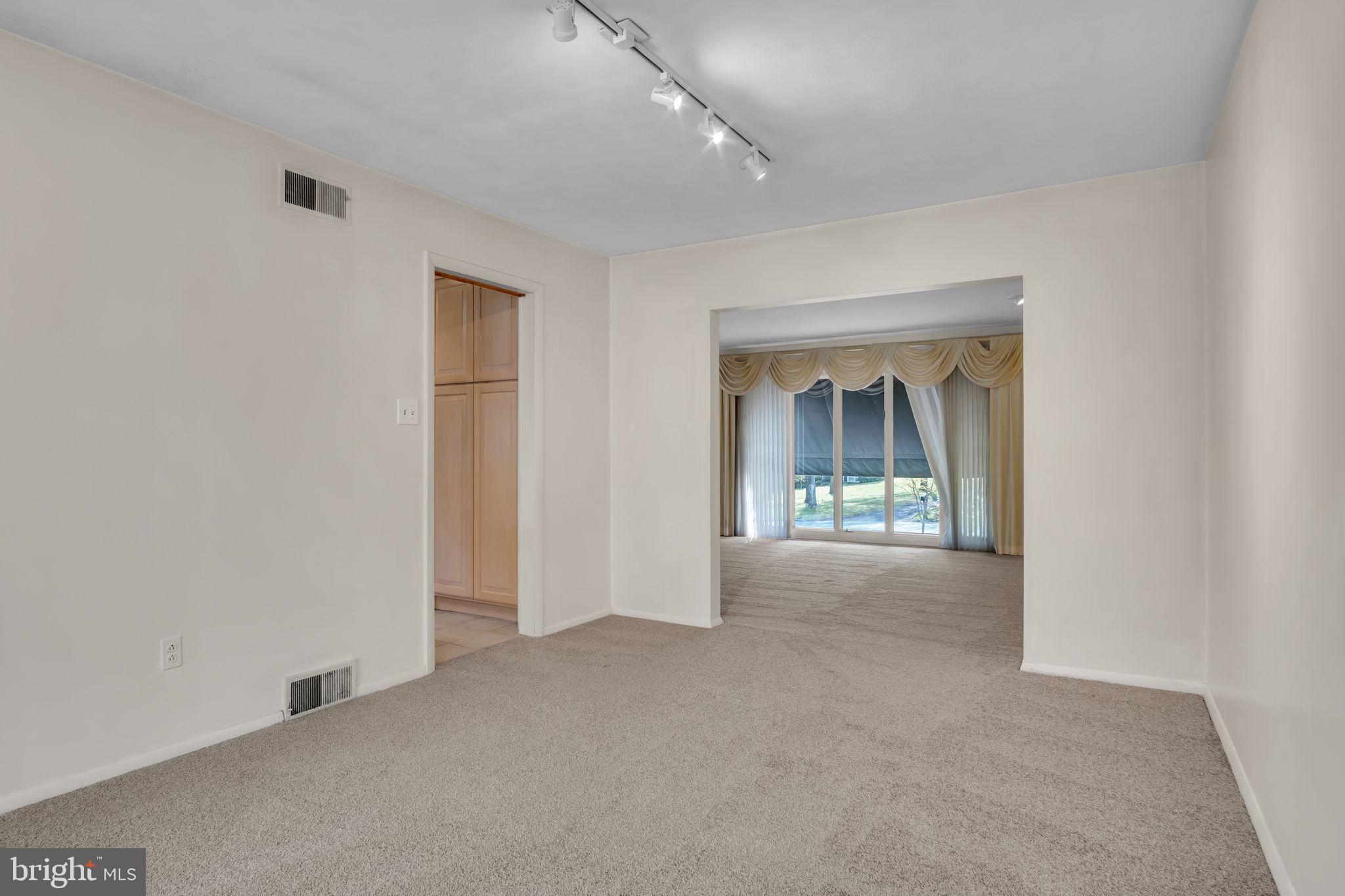 4536 Custer Drive Harrisburg, PA 17110 - Photo 12 of 53 an empty room with windows and entrance