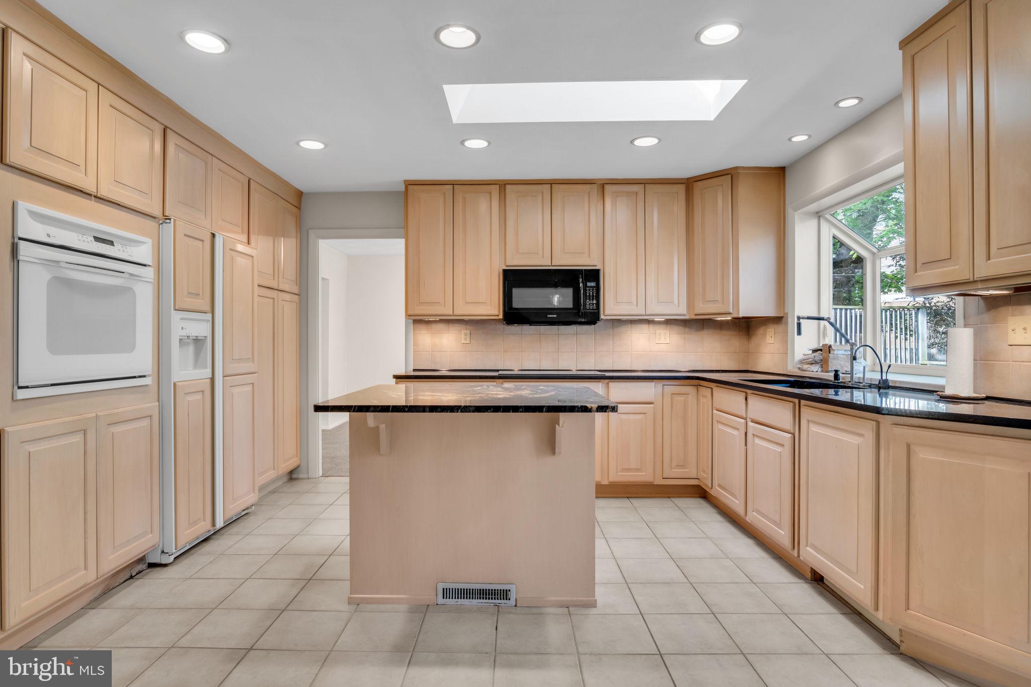 4536 Custer Drive Harrisburg, PA 17110 - Photo 17 of 53 a kitchen with stainless steel appliances granite countertop a refrigerator sink and cabinets
