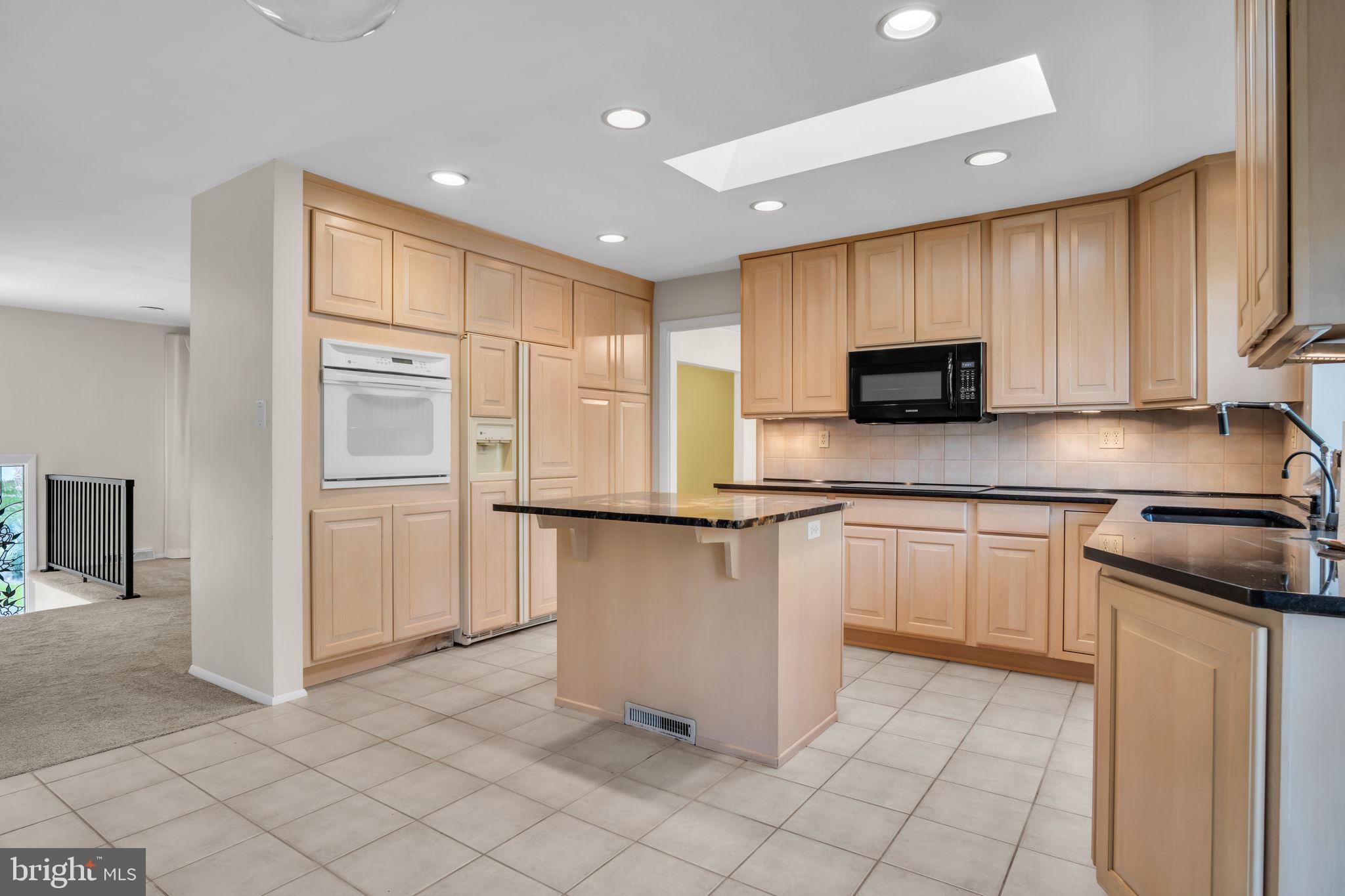 4536 Custer Drive Harrisburg, PA 17110 - Photo 18 of 53 a kitchen with stainless steel appliances granite countertop a refrigerator sink and cabinets