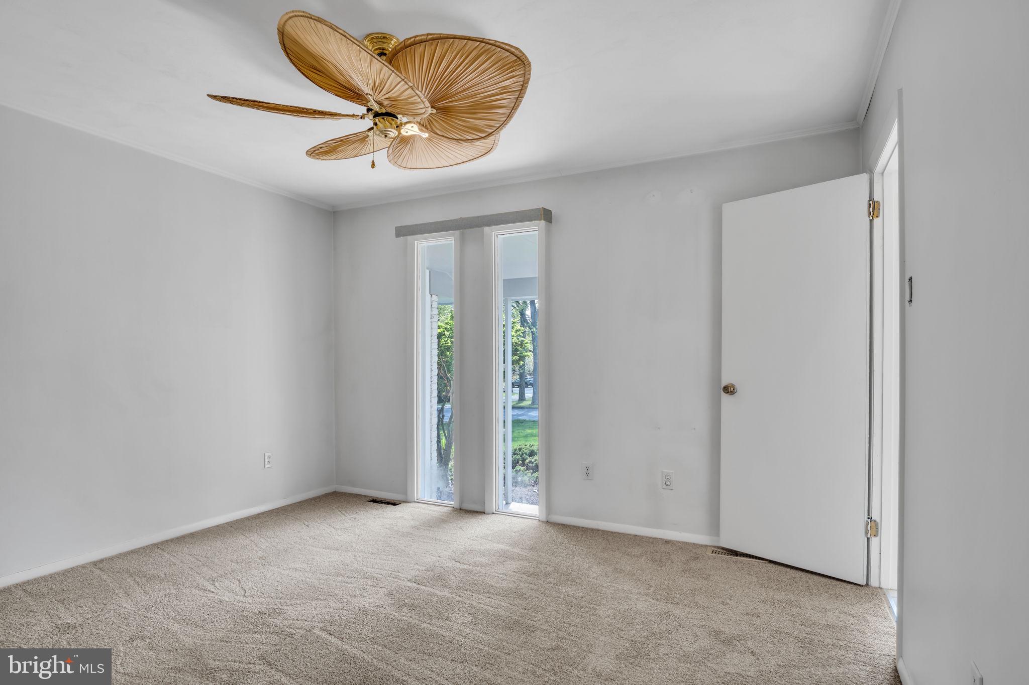 4536 Custer Drive Harrisburg, PA 17110 - Photo 25 of 53 an empty room with closet and a chandelier fan