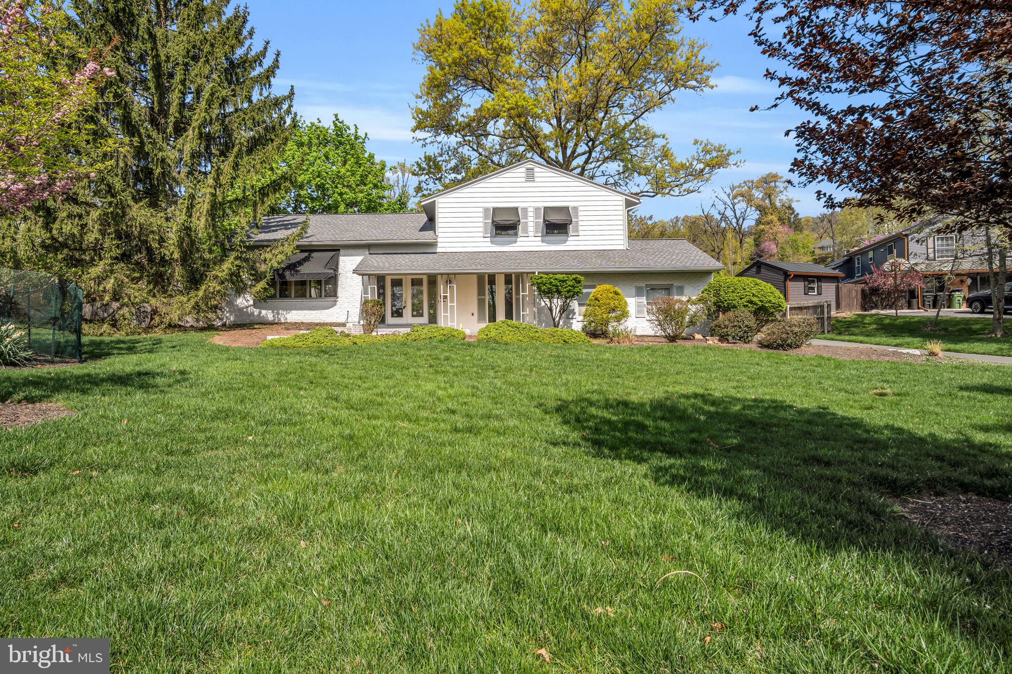 4536 Custer Drive Harrisburg, PA 17110 - Photo 3 of 53 a front view of a house with a garden