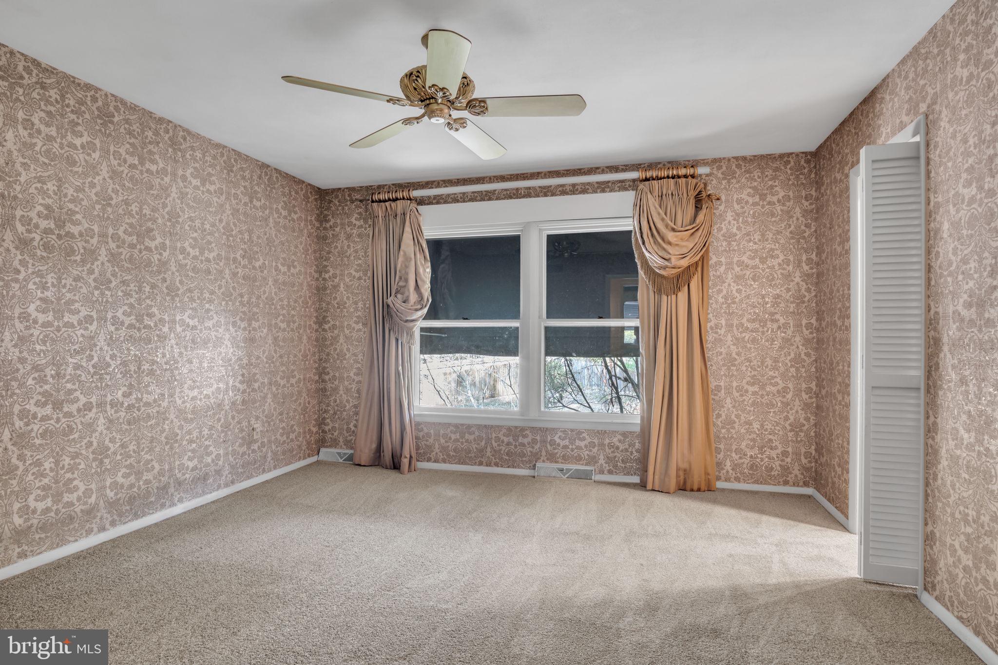 4536 Custer Drive Harrisburg, PA 17110 - Photo 32 of 53 a view of an empty room with a window