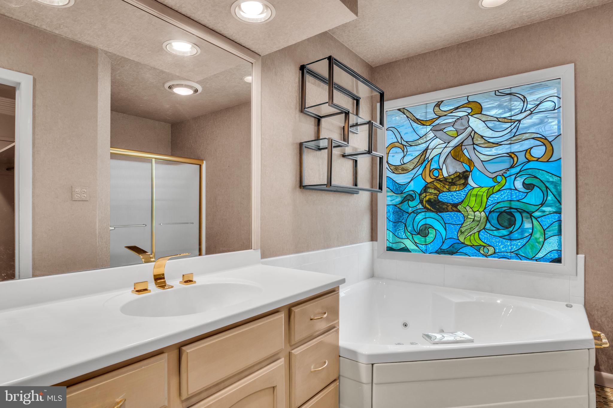 4536 Custer Drive Harrisburg, PA 17110 - Photo 35 of 53 a bathroom with a sink a bathtub and a shower