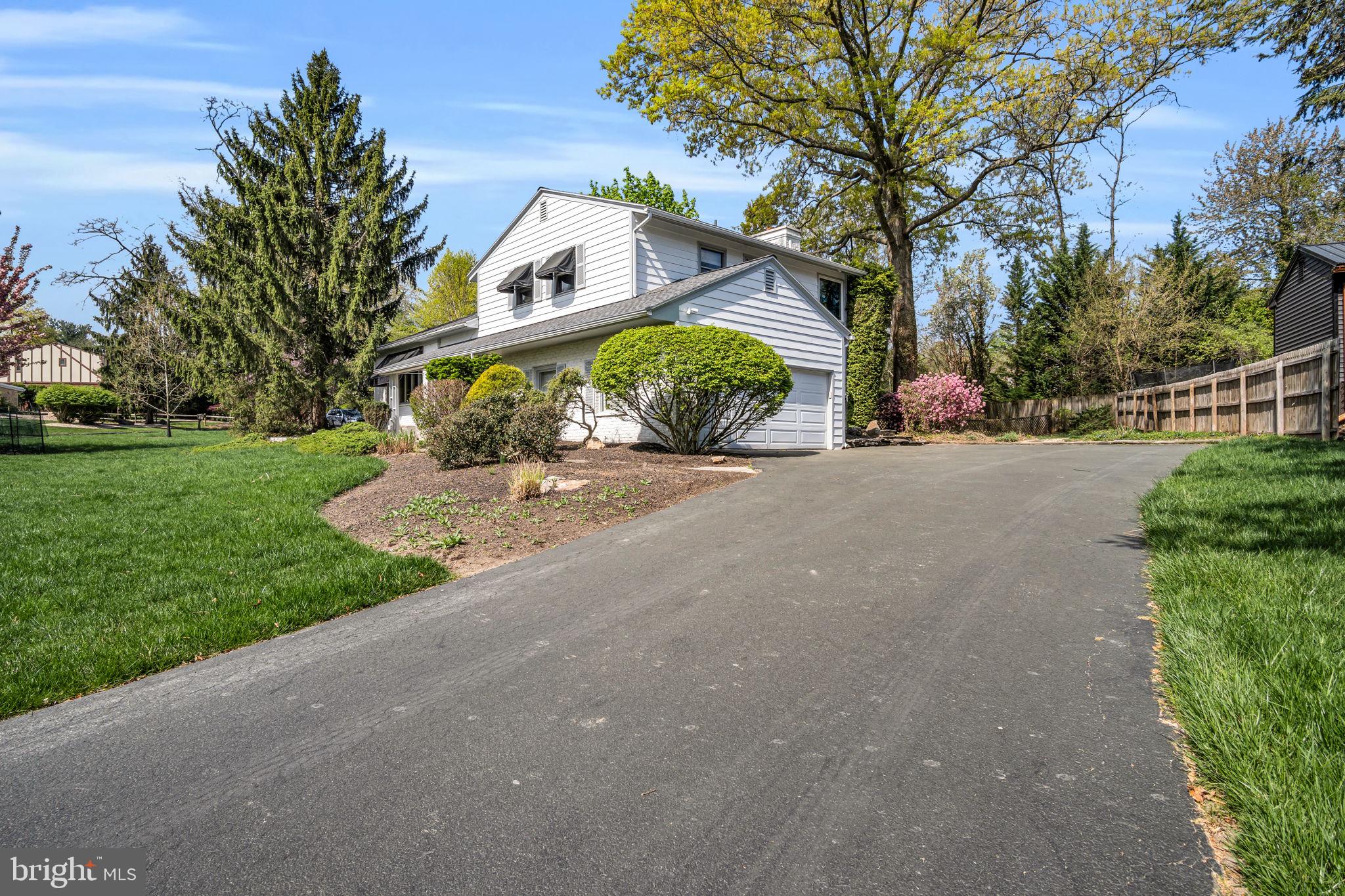 4536 Custer Drive Harrisburg, PA 17110 - Photo 48 of 53 a view of a house with a yard and large tree