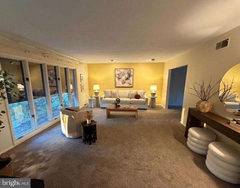 4536 Custer Drive Harrisburg, PA 17110 - Photo 6 of 53 a living room with furniture and a flat screen tv