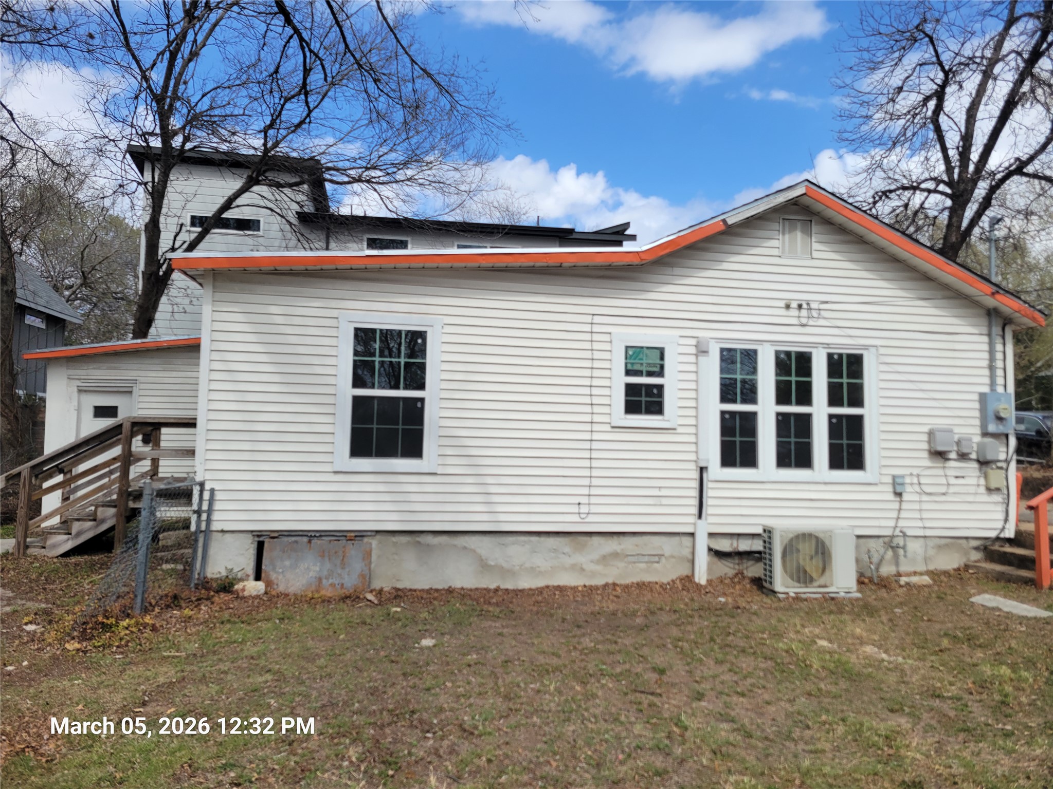 2000 Alamo Street Austin, TX 78722 - Photo 2 of 8 a view of a house with a yard
