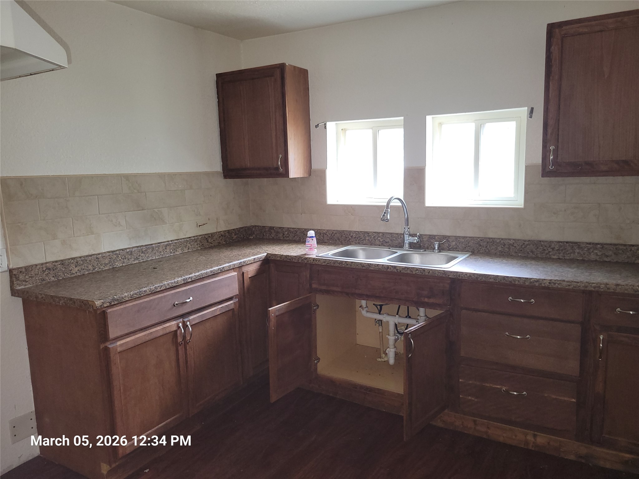 2000 Alamo Street Austin, TX 78722 - Photo 5 of 8 a kitchen with a sink and a window