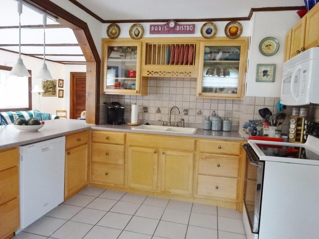 112 Crestmont Road Bangor, ME 04401 - Photo 8 of 35 The airy kitchen offers all of the...