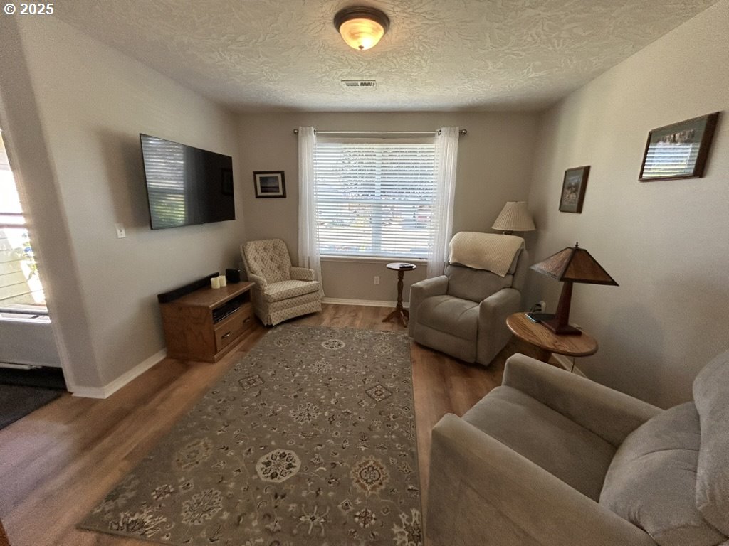 736 Kelsey Loop Molalla, OR 97038 - Photo 5 of 21 a living room with furniture and a window