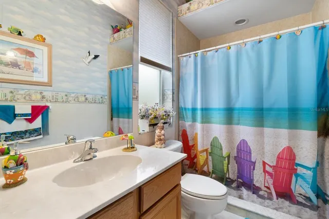 a view of house with backyard