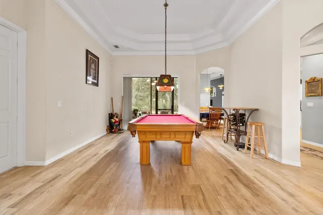 an aerial view of a house with outdoor space