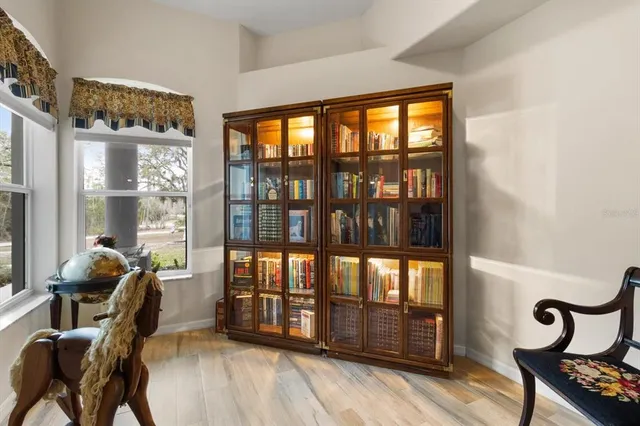 a kitchen with kitchen island granite countertop a sink and a stove