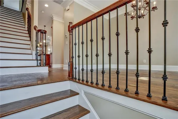 a view of a living room and staircase