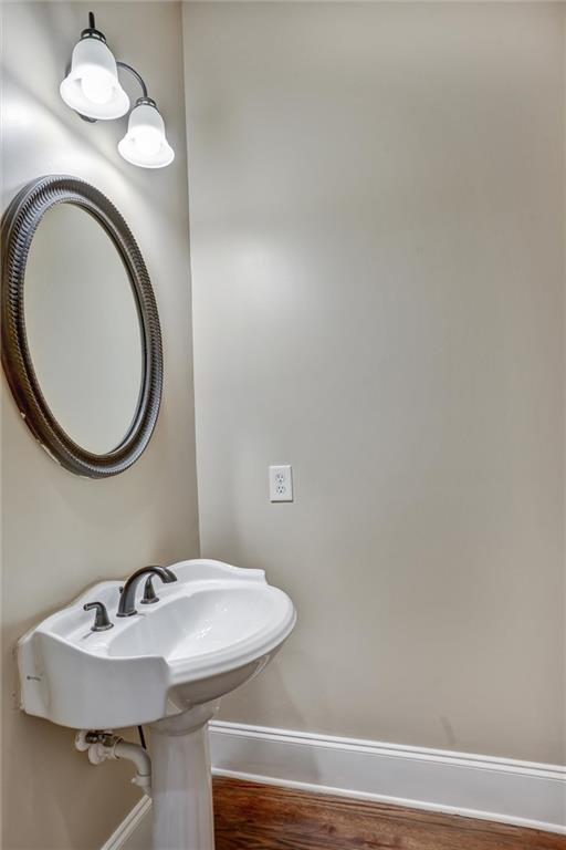 2443 Gatebury Circle Atlanta, GA 30341 - Photo 15 of 45 a bathroom with a sink and a mirror
